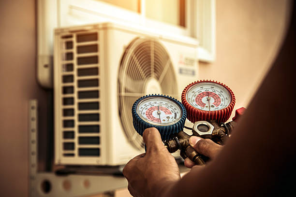 Professional Hvac technician working in Dickinson, ND